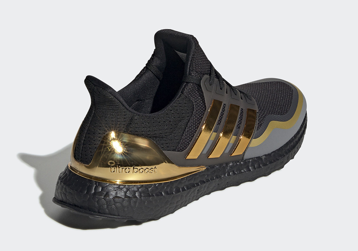adidas boost black and gold