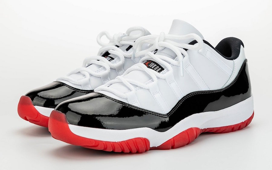 red black and white low top 11s